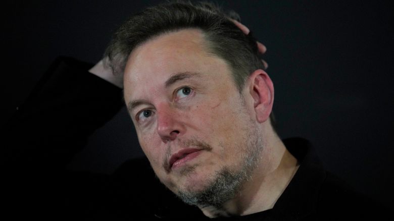 Tesla and SpaceX's CEO Elon Musk reacts during an in-conversation event with Britain's Prime Minister Rishi Sunak in London, Thursday, Nov. 2, 2023. Sunak discussed AI with Elon Musk in a conversation that is played on the social network X, which Musk owns.(AP Photo/Kirsty Wigglesworth, Pool)