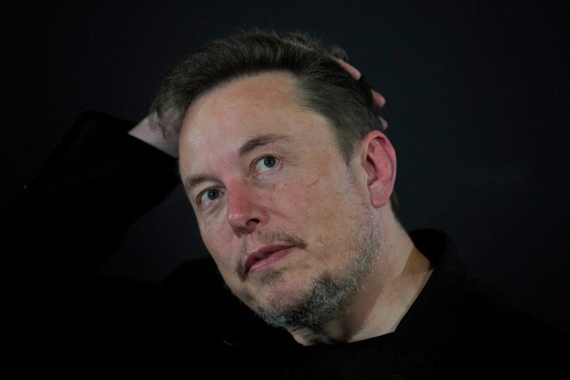 Tesla and SpaceX's CEO Elon Musk reacts during an in-conversation event with Britain's Prime Minister Rishi Sunak in London, Thursday, Nov. 2, 2023. Sunak discussed AI with Elon Musk in a conversation that is played on the social network X, which Musk owns.(AP Photo/Kirsty Wigglesworth, Pool)