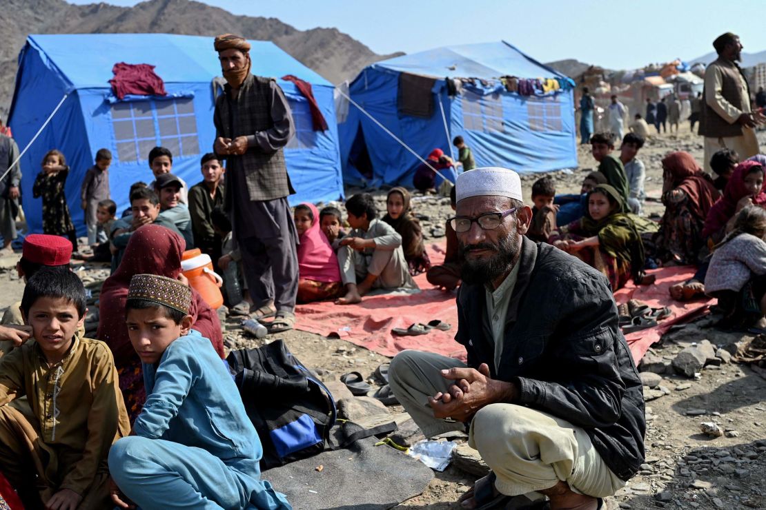Afghan refugees rest at a makeshift camp upon their arrival from Pakistan, near the Afghanistan-Pakistan Torkham border in Nangarhar province on November 2, 2023. More than 165,000 Afghans have fled Pakistan in the month since its government ordered 1.7 million people to leave or face arrest and deportation, officials said on November 2. (Photo by Wakil KOHSAR / AFP) (Photo by WAKIL KOHSAR/AFP via Getty Images)