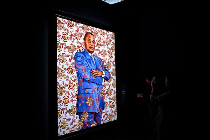 "Portrait of Denis Sassou Nguesso, President of the Republic of Congo" (2023) by Kehinde Wiley. Unlike Wiley's portrait of Barack Obama, which is on display at the Smithsonian's National Portrait Gallery, the portraits in "A Maze of Power" are not official. The sitters were not shown their portraits before they went on display. A representative from the gallery said no leader had visited the collection at the time of writing.  