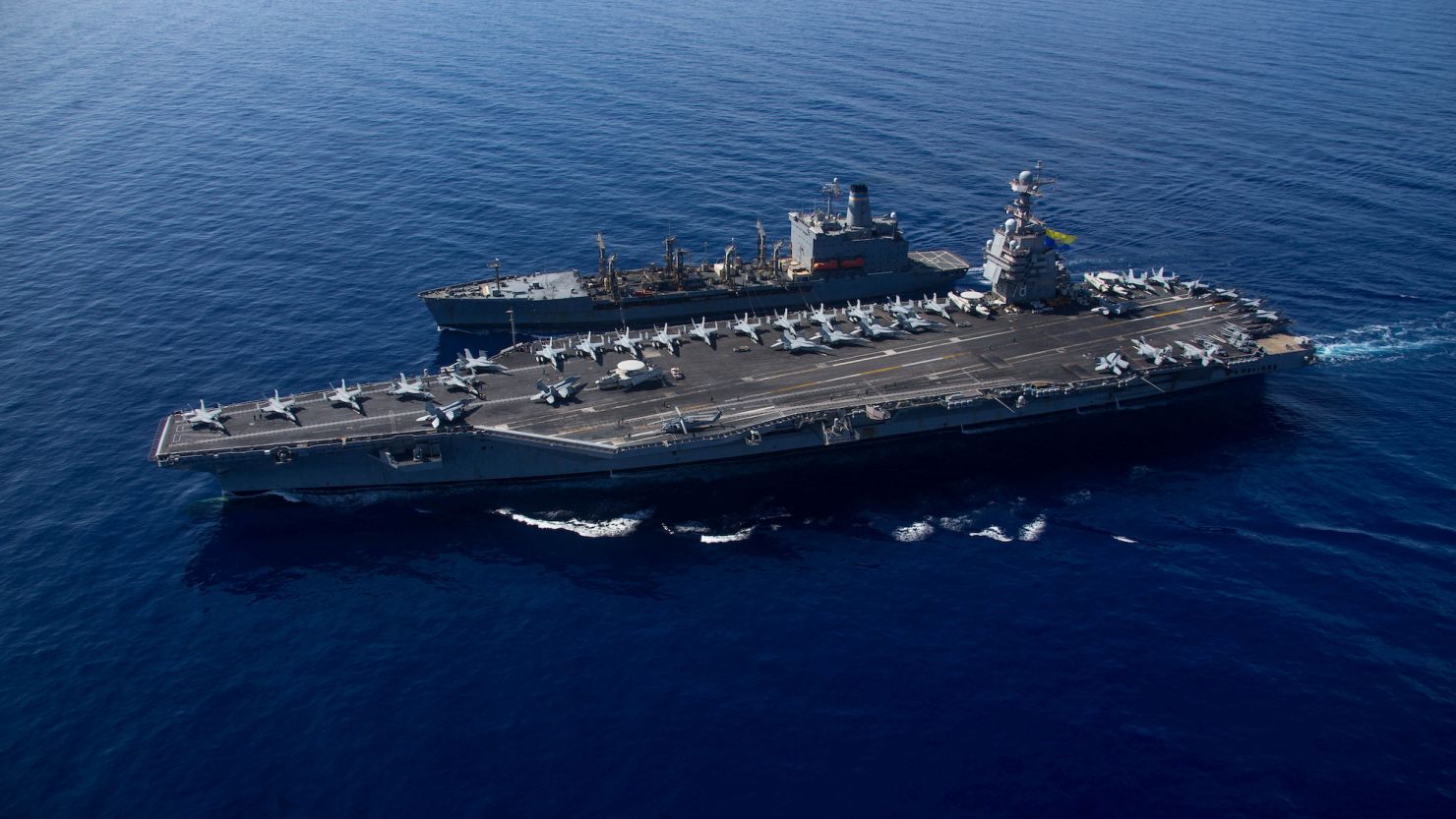 The worldÕs largest aircraft carrier USS Gerald R. Ford steams alongside USNS Laramie (T-AO-203) during a fueling-at-sea in the eastern Mediterranean Sea, as a scheduled deployment in the U.S Naval Forces Europe area of operations, deployed by U.S. Sixth Fleet to defend U.S, allied, and partners interests, in this photo taken on October, 11, 2023 and released by U.S. Navy on October 14, 2023. U.S Naval Forces Central Command / U.S. 6th Fleet / Handout via REUTERS ATTENTION EDITORS - THIS PICTURE WAS PROVIDED BY A THIRD PARTY