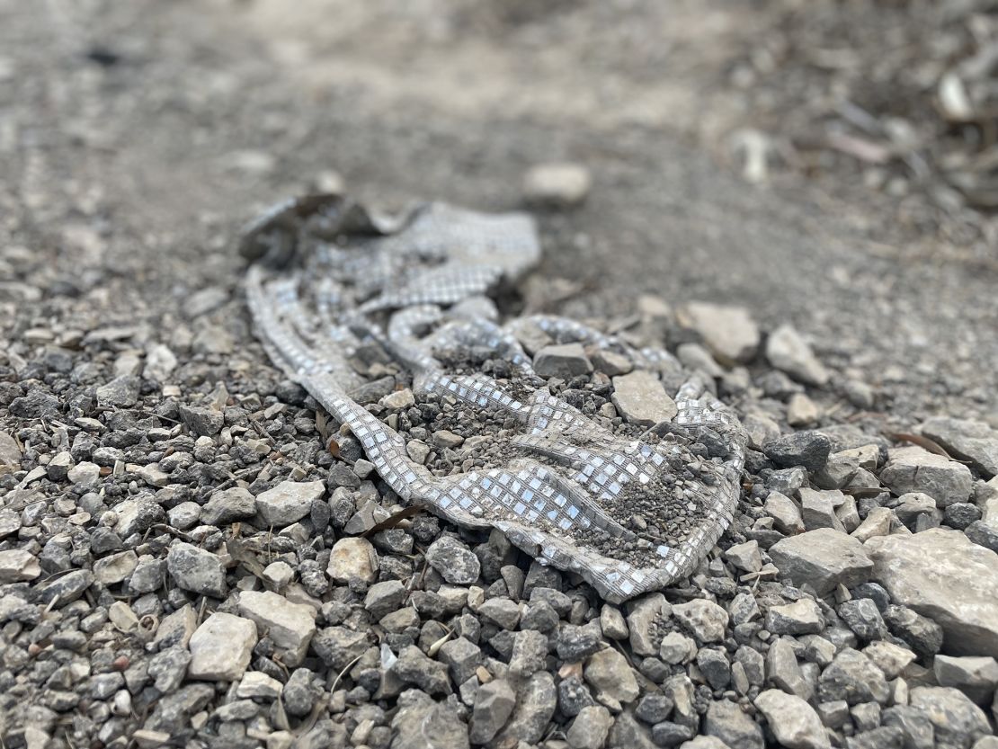 A sparkly sequin dress left over in the debris