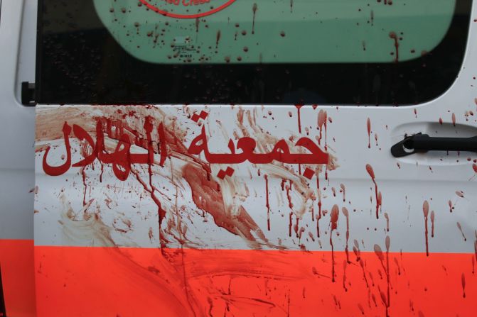 Blood is splattered on the side of an ambulance after an Israeli airstrike outside Al-Shifa Hospital in Gaza City on Friday, November 3.