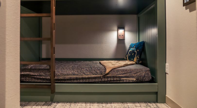 <strong>A family retreat: </strong>Suites with bunk rooms outfitted with camping-style bedding cater to families.