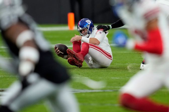 New York Giants quarterback Daniel Jones grimaces after being sacked during the Giants' 30-6 loss to the Las Vegas Raiders on November 5.