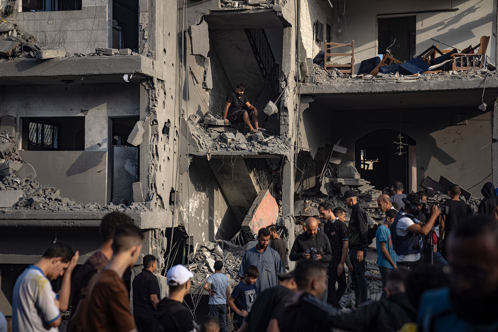 Palestinians look for survivors following an Israeli bombardment in the Al-Maghazi refugee camp, Gaza, on November 5.