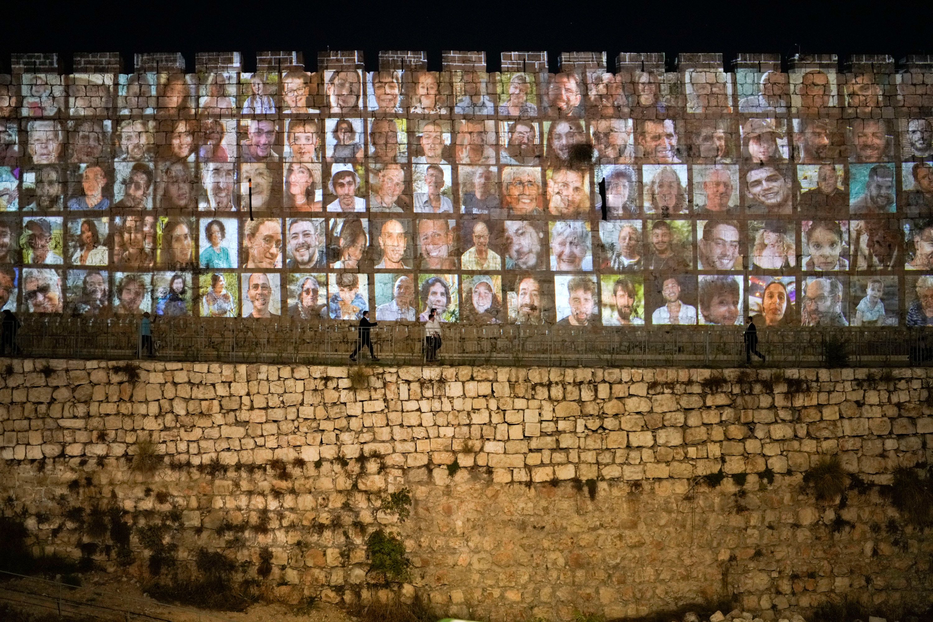 Photographs of Israeli hostages being held by Hamas militants are projected onto the walls of Jerusalem's Old City on November 6.