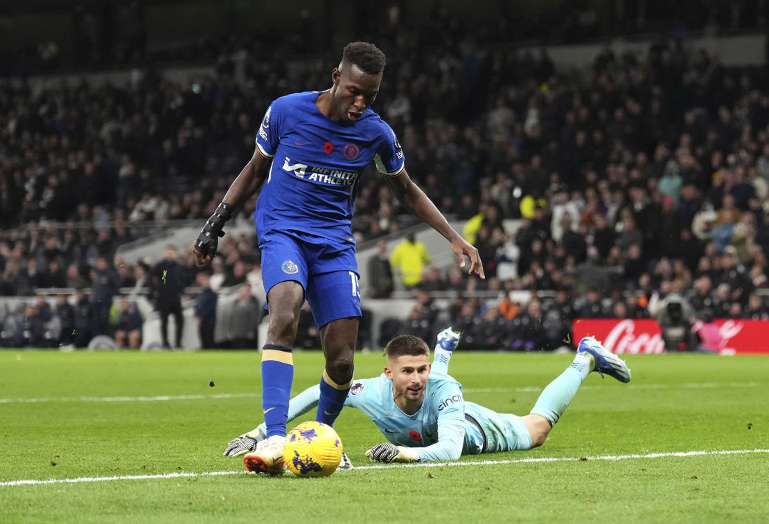 Chelsea's Nicolas Jackson scores their side's fourth goal of the game and his hat-trick during the Premier League match at the Tottenham Hotspur Stadium, London. Picture date: Monday November 6, 2023. 74476322 (Press Association via AP Images)