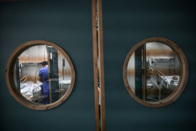 On October 13, doctors at Nasser Hospital in Khan Younis, Gaza, examine children injured in Israeli attacks.