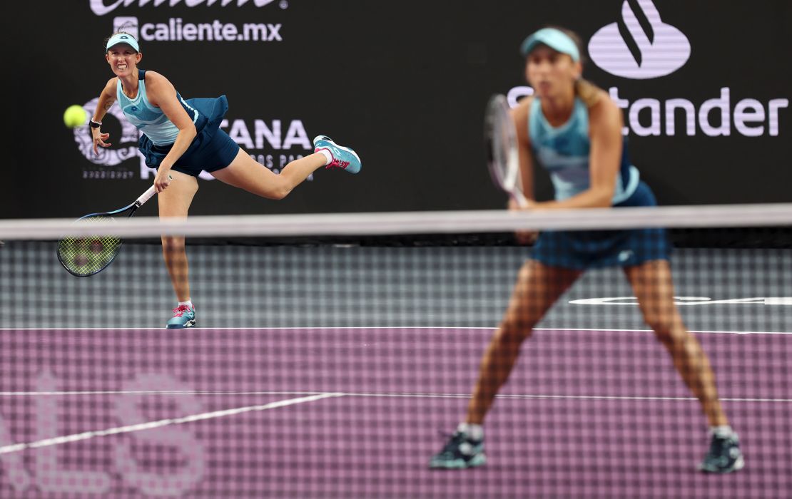 CANCUN, MEXICO - NOVEMBER 02: Elise Mertens of Belgium (R) and Storm Hunter of Australia in action against Desirae Krawczyk of the United States and Demi Schuurs of the Netherlands in their round robin doubles match during day 5 of the GNP Seguros WTA Finals Cancun 2023 part of the Hologic WTA Tour on November 02, 2023 in Cancun, Mexico. (Photo by Clive Brunskill/Getty Images)