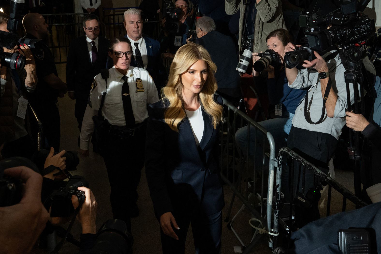 Trump's daughter Ivanka leaves for a lunch break after testifying in the case on November 8. She discussed her role in negotiating loans for her father's purchases of the Doral golf resort in Florida and the Old Post Office in Washington, DC.