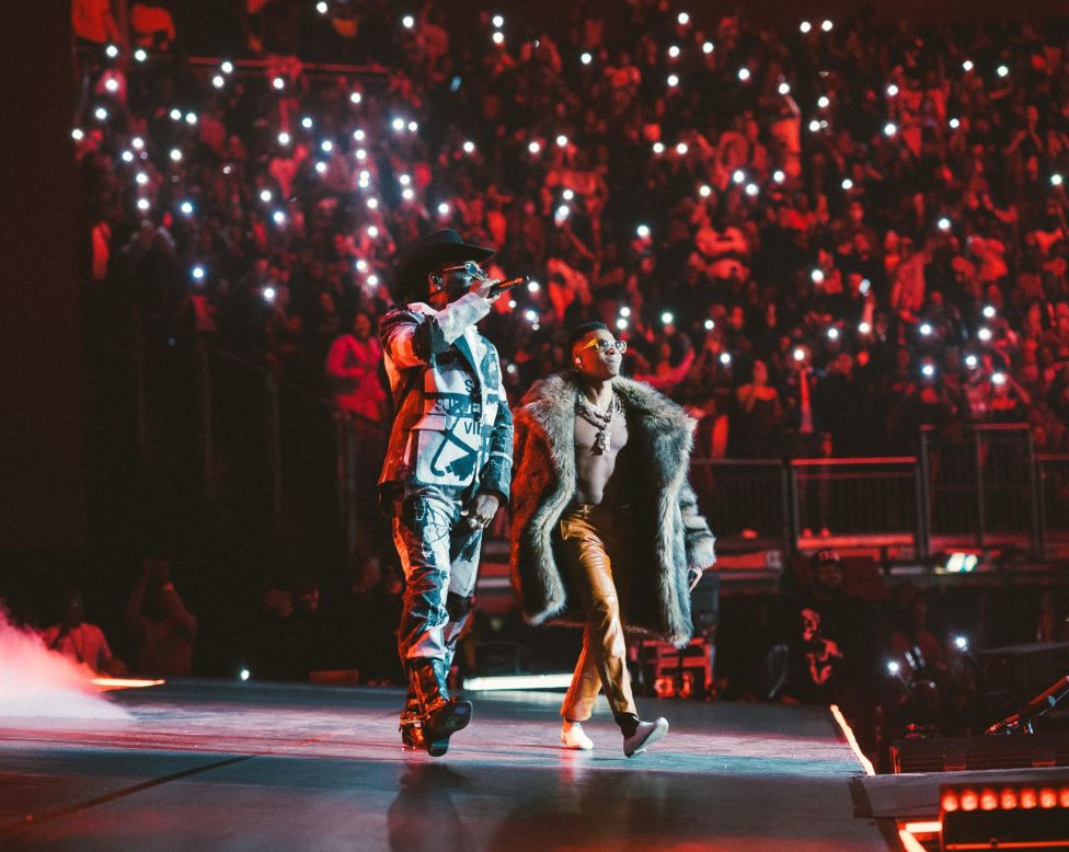 Burna Boy and Wizkid unite on stage at the O2 Arena in London, 2021. The artists are arguably the largest Afrobeats musicians, migrating from arena to stadium tours in recent years.