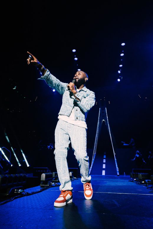 Davido back on stage this summer. Akinfeleye says Afrobeats concerts are all about joy. "That's a joy I want the world to see," he said. "I want my imagery to convey that feeling."