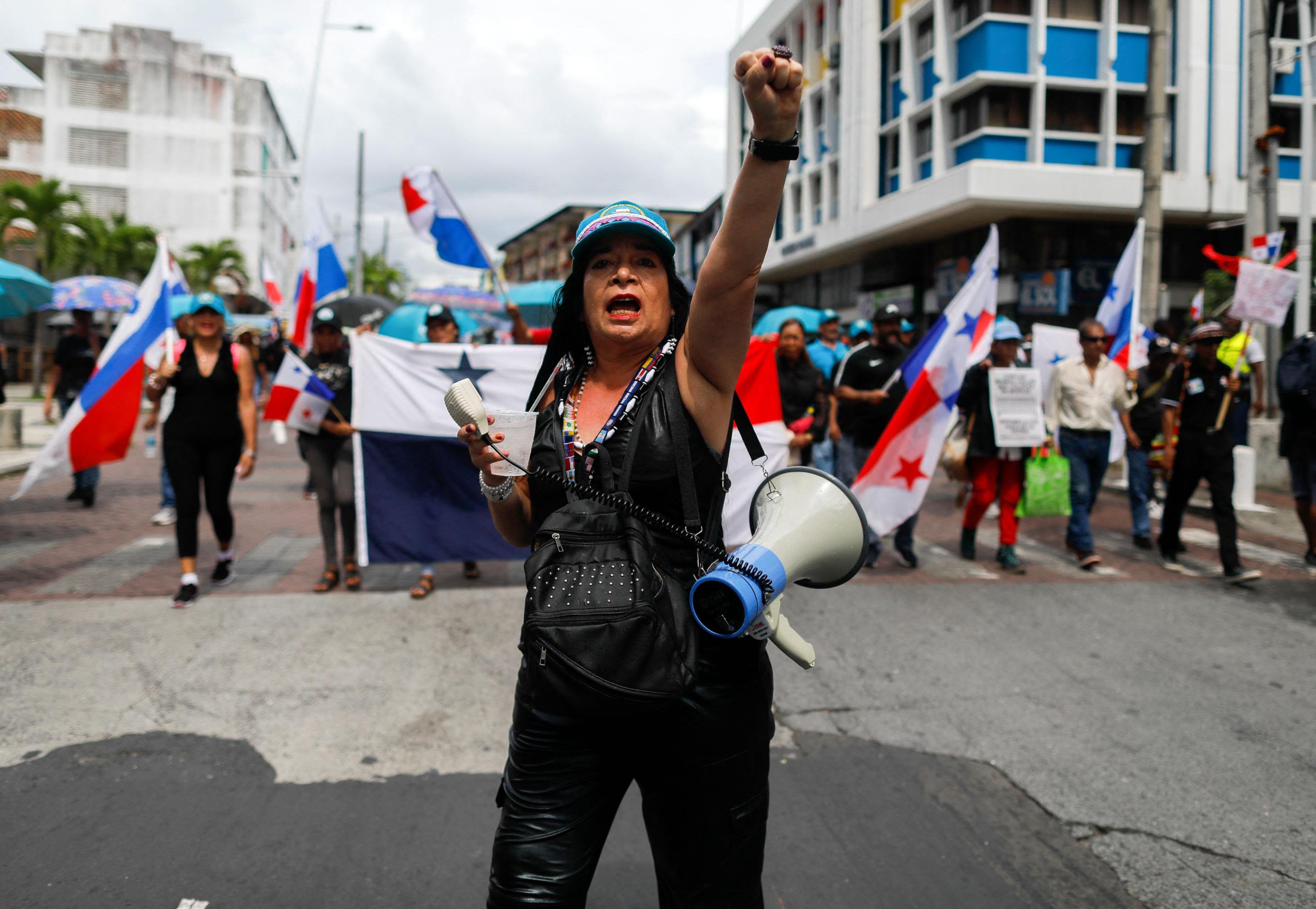 Teachers march to protest the deaths of two teachers during a demonstration against the government's contract with Canadian mining company First Quantum and its subsidiary Minera Panama in Panama City on November 8, 2023. A man shot dead two teachers who were participating in blocking a route in a town located 80 km west of Panama City on November 7, in the third week of protests against a Canadian mining company. These are the first fatalities left by the protests that began on October 20 against the contract between the government and the company First Quantum Minerals (FQM), which operates the largest open-pit copper mine in Central America in the Panamanian Caribbean. (Photo by Roberto CISNEROS / AFP) (Photo by ROBERTO CISNEROS/AFP via Getty Images)