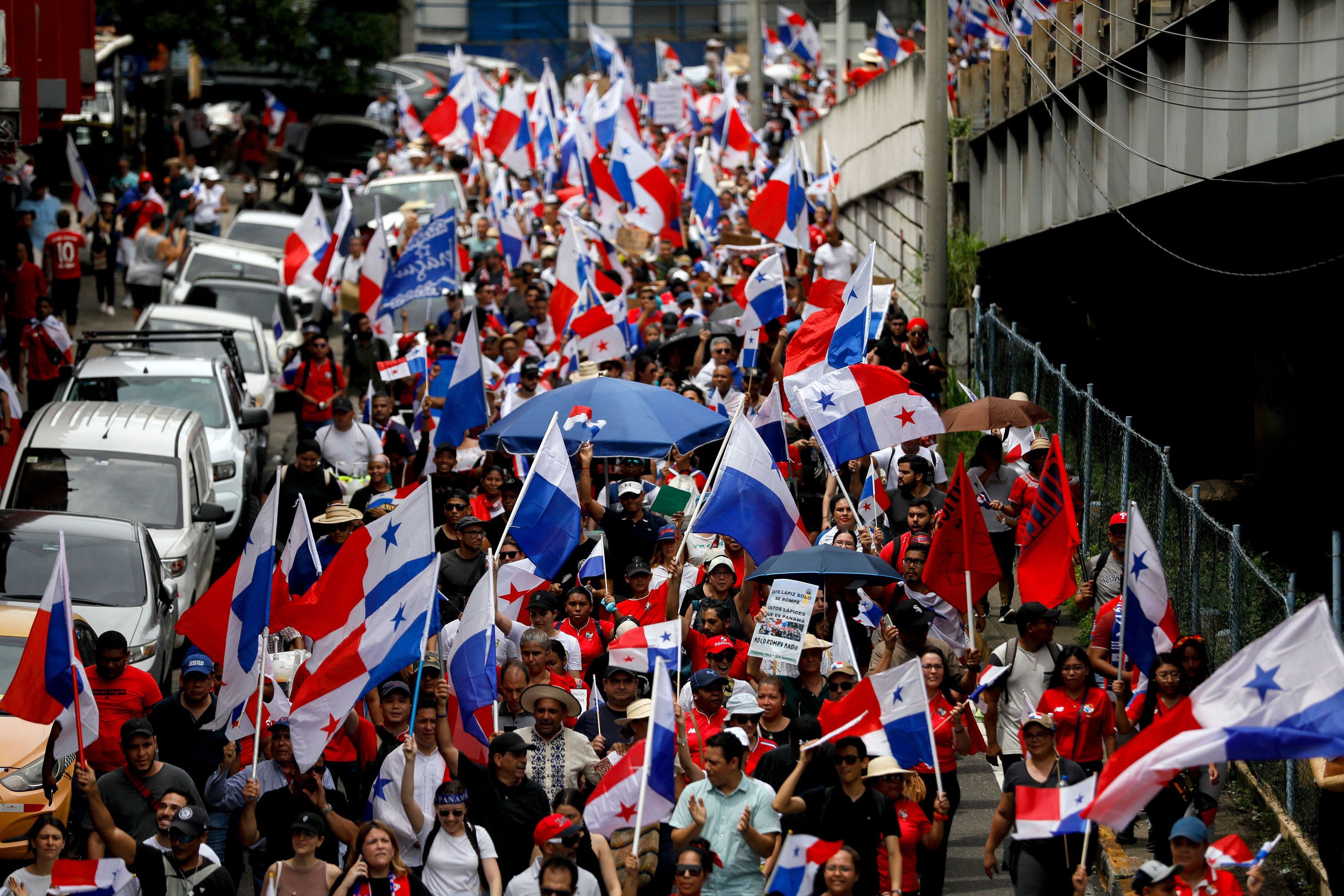 People protest during a march against the government contract with Canadian mining company First Quantum and its subsidiary Minera Panama in Panama City on November 3, 2023. Panama's parliament on Friday approved a moratorium on new metal mining contracts after thousands took to the streets for days on end to protest a deal with a Canadian copper company. (Photo by Roberto CISNEROS / AFP) (Photo by ROBERTO CISNEROS/AFP via Getty Images)