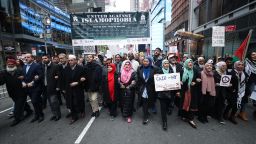 NEW YORK, USA - MARCH 24 : Demonstrators march with banners during a protest against Islamophobia following the attacks at Christchurch in New Zealand on March 24, 2019 in New York, United States. Turkish American National Steering Committee (TASC) Co-Chair Halil Mutlu (2nd L) also attended the demonstration. (Photo by Atilgan Ozdil/Anadolu Agency/Getty Images)