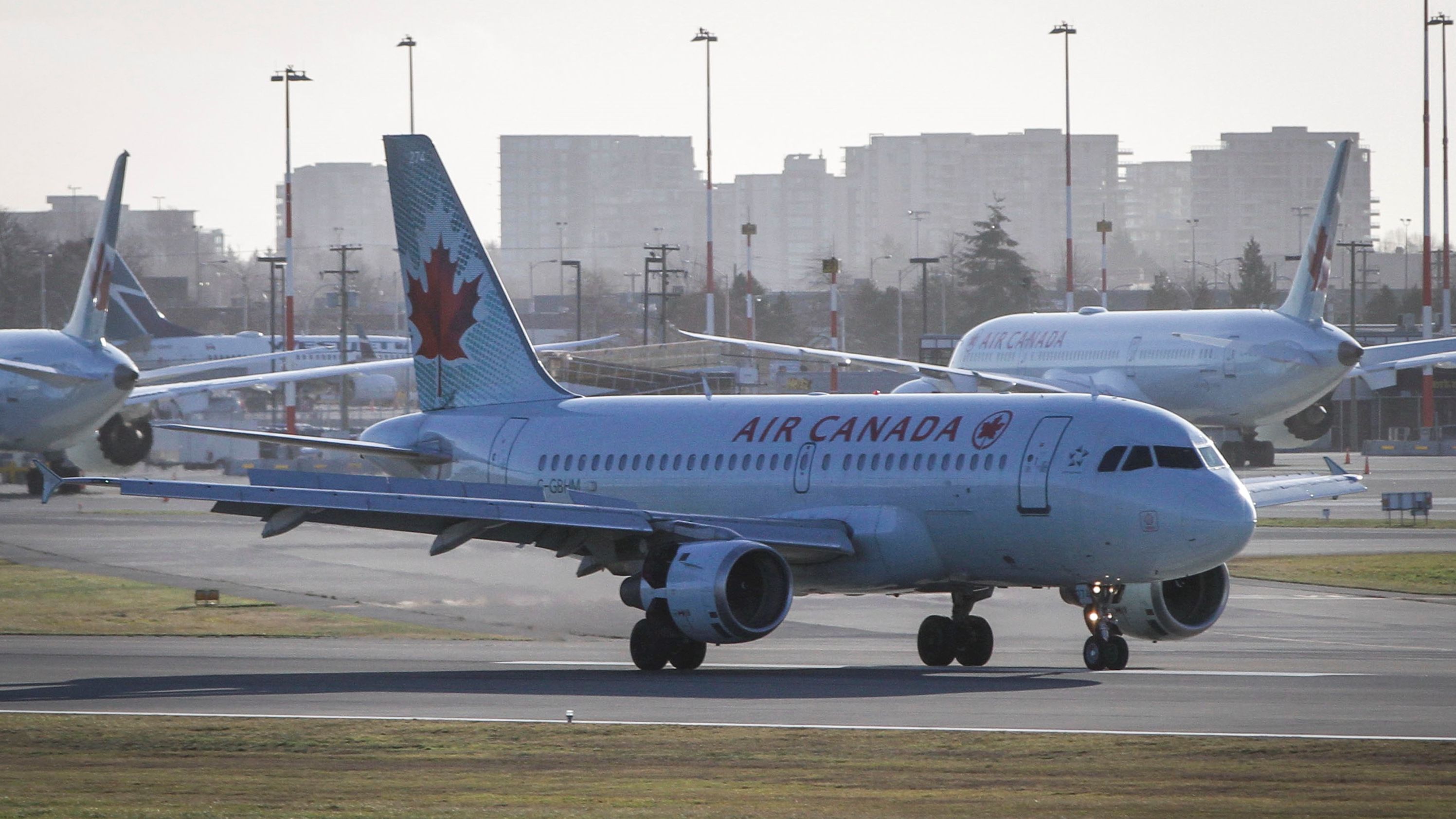 Air Canada aircraft are seen on the runway of Vancouver International Airport in Richmond, British Columbia, in a 2021 photo.