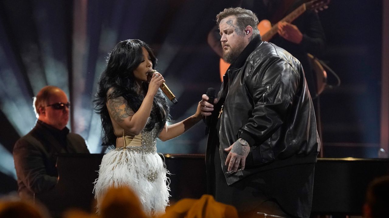 K. Michelle, left, and Jelly Roll perform "Love Can Build a Bridge" at the 57th Annual CMA Awards on Wednesday, Nov. 8, 2023, at the Bridgestone Arena in Nashville, Tenn. (AP Photo/George Walker IV)