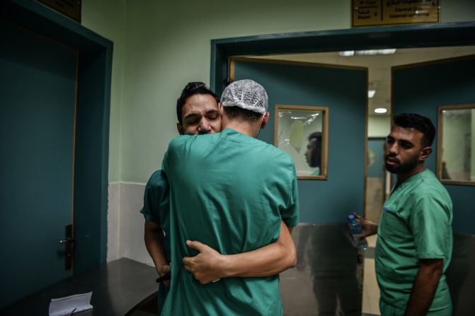 A Palestinian nurse at Nasser Hospital in Khan Younis, Gaza mourns after receiving news that his brother has died.
