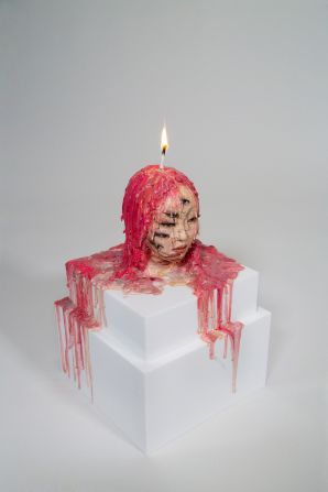 For her 2023 piece "Sleepless Night," Yoon lit a candle in a waxwork based on her own image to mark her 30th birthday. 