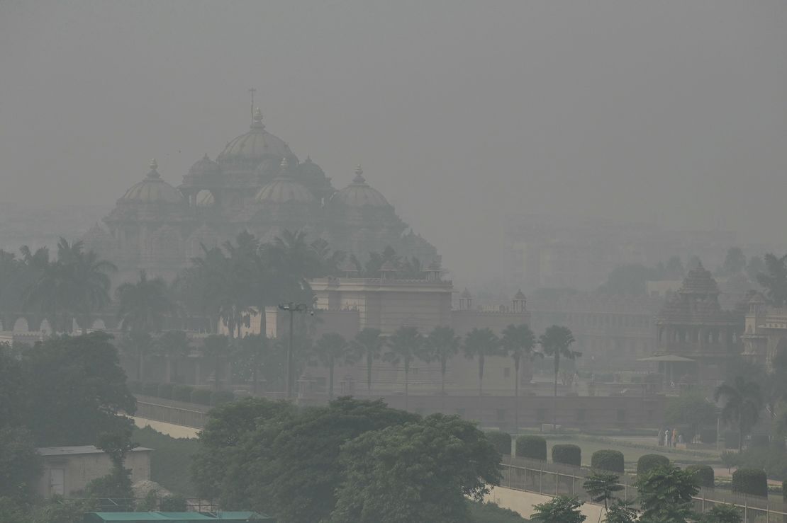 The Akshardham temple is seen amid heavy smog conditions in New Delhi on November 9, 2023.