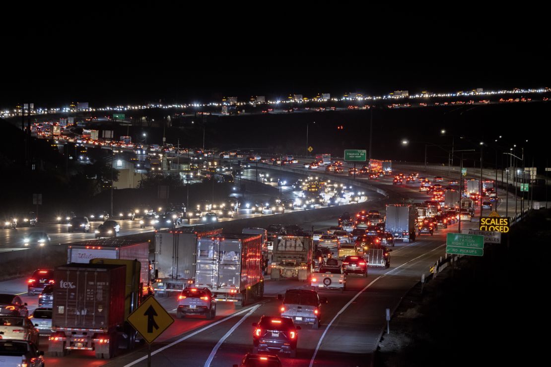 HESPERIA, CA - NOVEMBER 22: Pre-holiday traffic moves slowly on the Interstate 15 freeway through Cajon Pass, the primary route between Los Angeles and Las Vegas, on November 22, 2022 near Hesperia, California. An estimated 54.6 million people will travel 50 miles or more from home this Thanksgiving, 98% of pre-pandemic volumes, according to AAA. (Photo by David McNew/Getty Images)