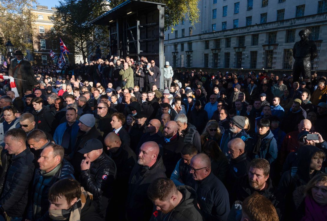 Attendees pay their respects at the Cenotaph ahead of a pro-Palestinian rally, on Armistice Day, in London, UK, on Saturday, Nov. 11, 2023. Tensions have run high for days as ministers warned the protest they've been held each Saturday since the Israel-Hamas war began would disrupt a traditional day of reflection.
