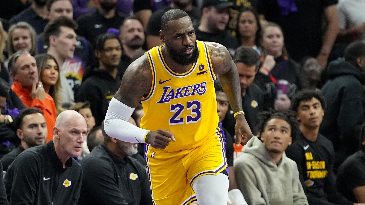 Los Angeles Lakers forward LeBron James (23) runs up court against the Phoenix Suns during the first half of an NBA basketball game, Friday, Nov. 10, 2023, in Phoenix. (AP Photo/Matt York)