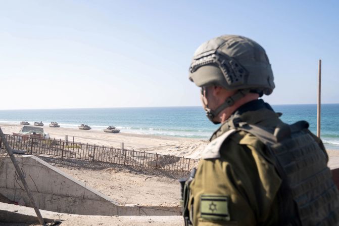 Israeli soldiers and military vehicles take a position inside Gaza in this Israel Defense Forces (IDF) handout picture obtained by Reuters, on November 11.