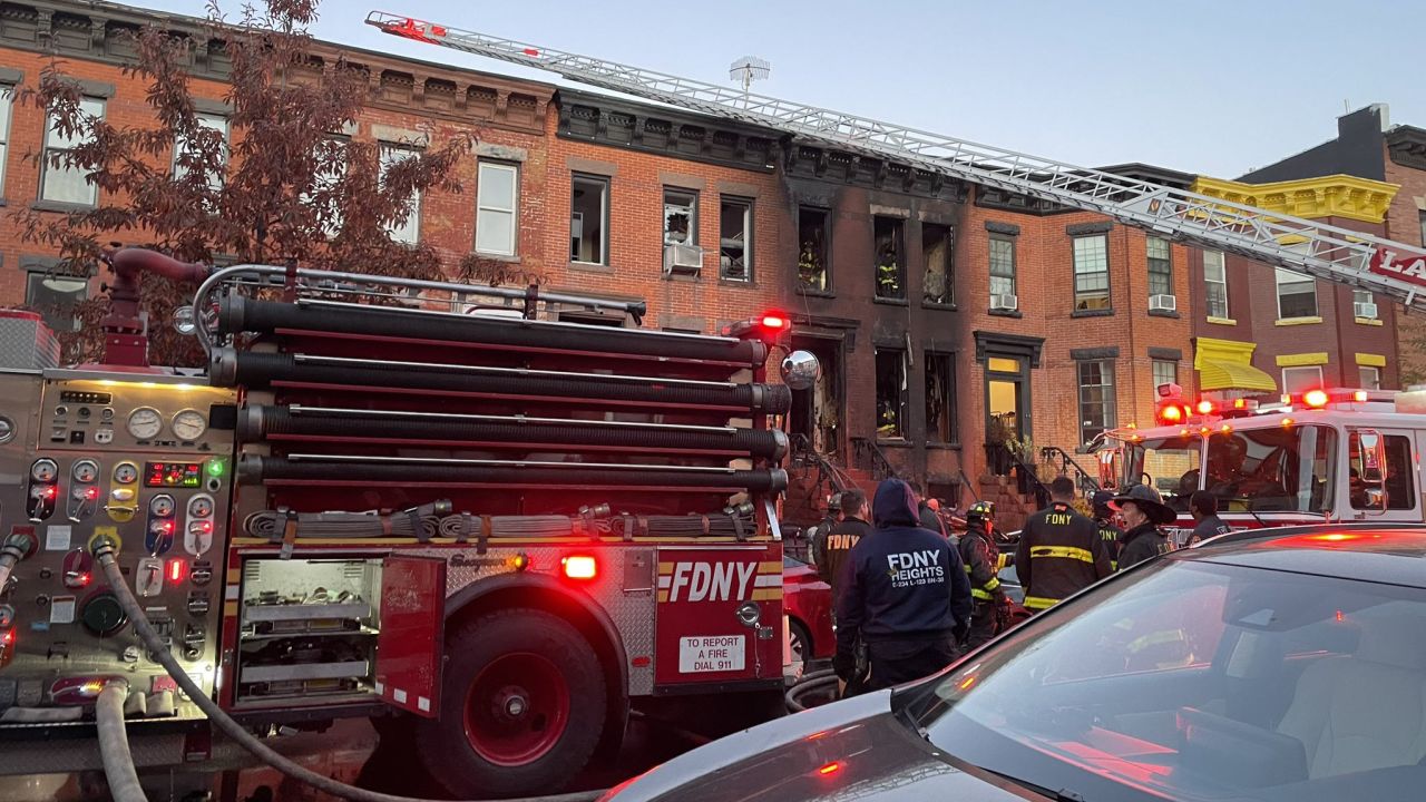 Firefighters battled flames on all three floors of the Albany Avenue brownstone.