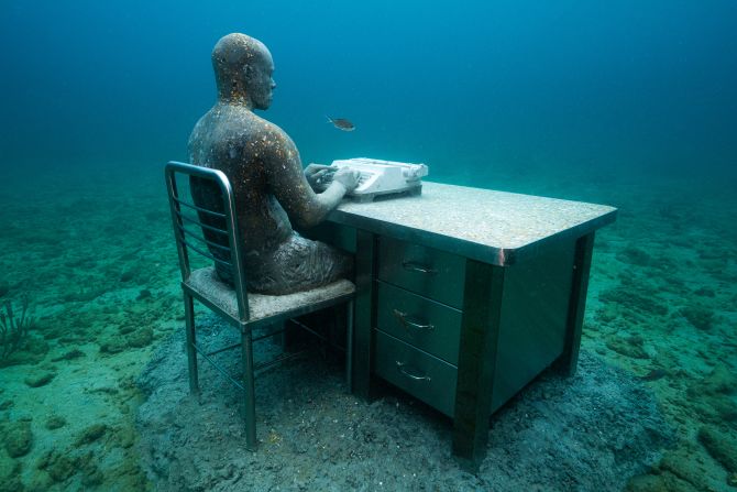 <strong>Beneath the surface:</strong> This underwater sculpture by deCaires Taylor, titled "The Lost Correspondent," has been at the park since 2006.
