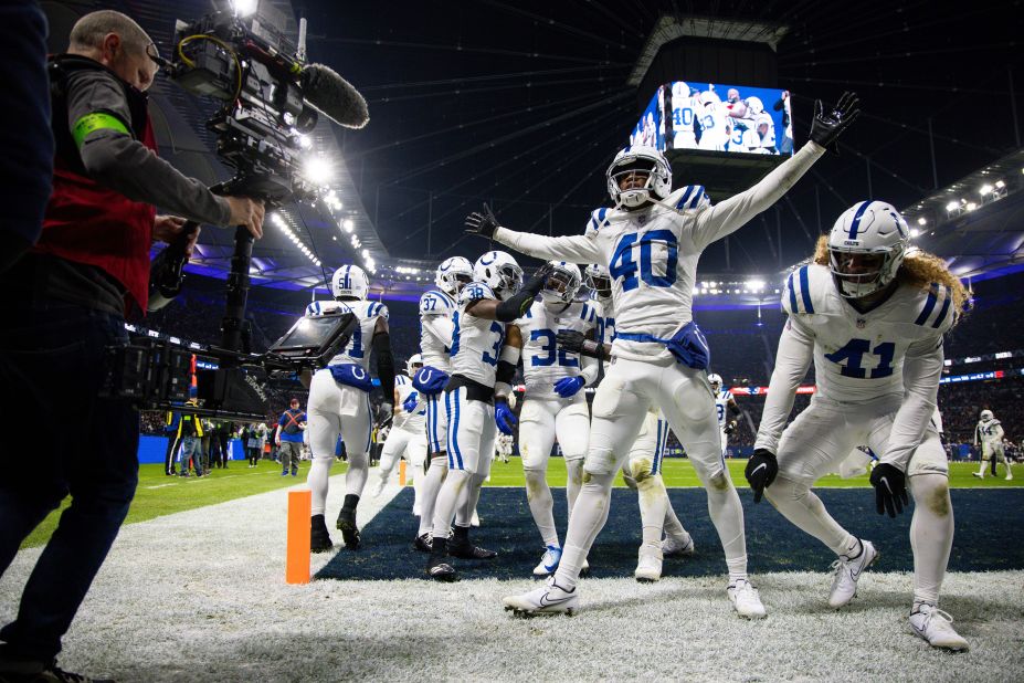 Indianapolis Colts safety Julian Blackmon celebrates with teammates after intercepting the ball during the Colts' 10-6 victory over the New England Patriots in Frankfurt, Germany, on Sunday, November 12. 