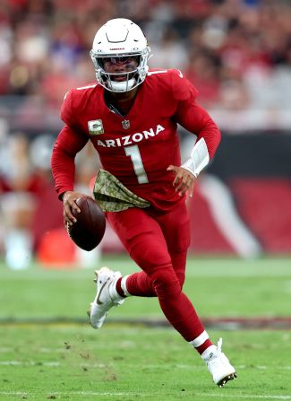 Arizona Cardinals quarterback Kyler Murray runs the ball during the Cardinals' 25-23 victory over the Atlanta Falcons on November 12. It was Murray's first game back in action after being <a href="index.php?page=&url=https%3A%2F%2Fwww.cnn.com%2F2022%2F12%2F13%2Fsport%2Fcardinals-patriots-kyler-murray-hurt-intl-spt%2Findex.html" target="_blank">injured late last season</a>.