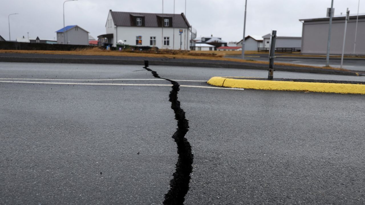 Cracks emerge on a road due to volcanic activity near a police station, in Grindavik, Iceland November 11, 2023.   RUV/Ragnar Visage/Handout via REUTERS    THIS IMAGE HAS BEEN SUPPLIED BY A THIRD PARTY. NO RESALES. NO ARCHIVES. MANDATORY CREDIT