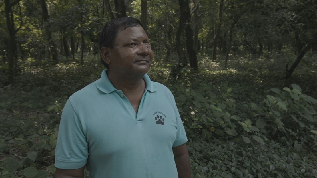 Bhadai Tharu, pictured, was attacked by a tiger and lost his eye in 2004. He still works with tiger conservation, and works to reduce human-animal conflict in the Khata corridor.