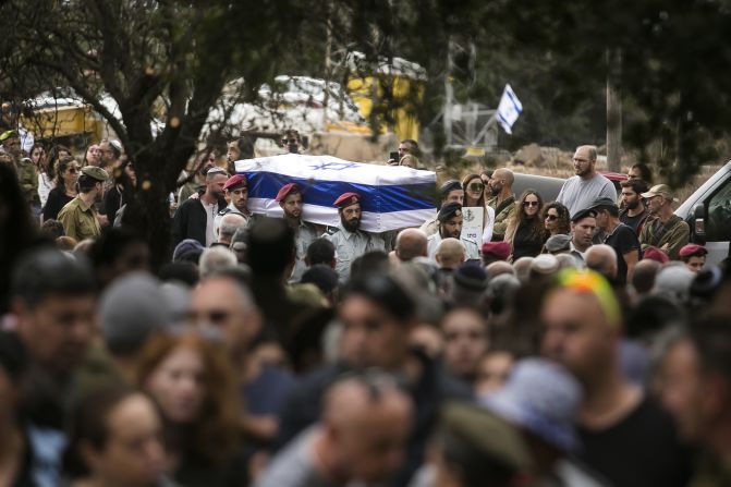 Family and friends attends the funeral of Israeli soldier Matan Meir on November 13 in Odem, Israel. 
