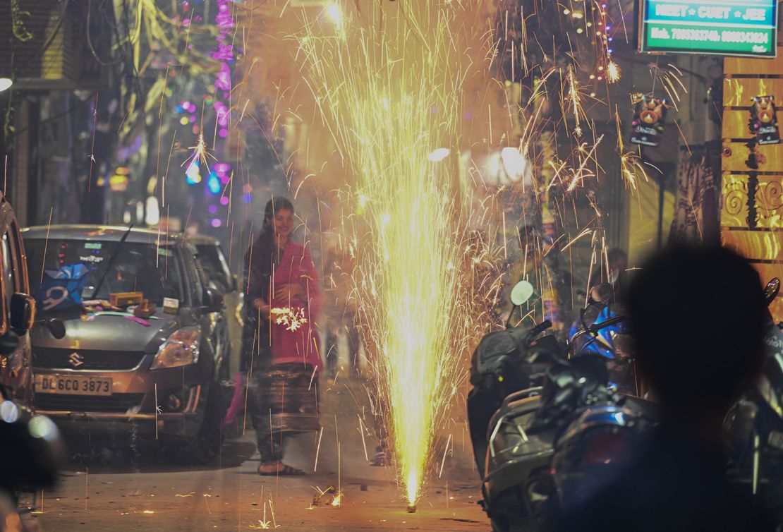 Children burst firecrackers on Diwali at pandav Nagar Area on November 12, 2023 in New Delhi, India.