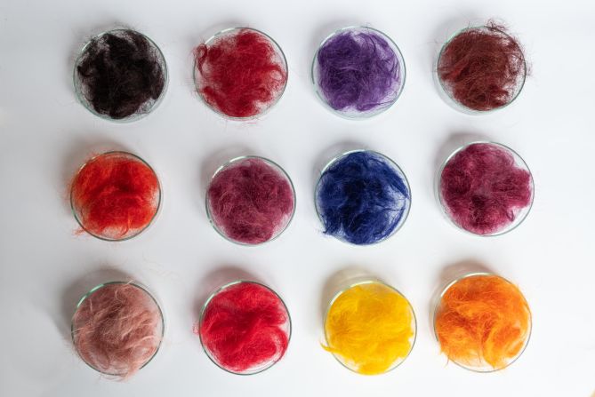 Kollar explains that using its material is not that different from knitting a sweater with wool. Short hairs are spun together and transformed into a continuous thread to make a yarn, and then dyed with pure pigments. Pictured are some dyed samples of the human hair textile. 