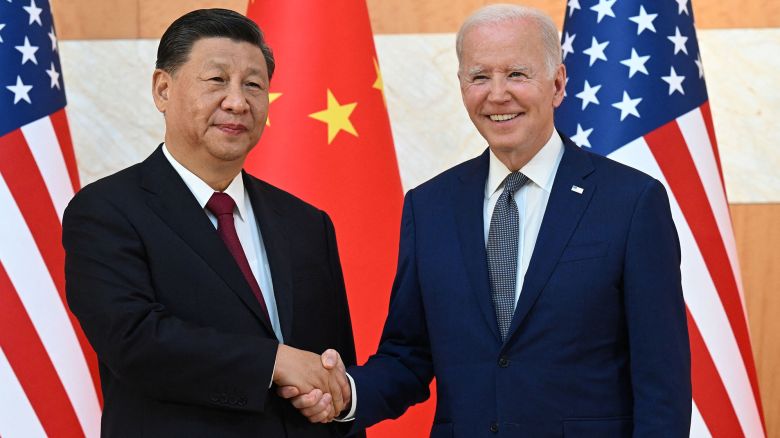 US President Joe Biden (R) and China's President Xi Jinping (L) shake hands as they meet on the sidelines of the G20 Summit in Nusa Dua on the Indonesian resort island of Bali on November 14, 2022. (Photo by SAUL LOEB / AFP) (Photo by SAUL LOEB/AFP via Getty Images)