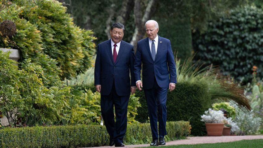 TOPSHOT - US President Joe Biden (R) and Chinese President Xi Jinping walk together after a meeting during the Asia-Pacific Economic Cooperation (APEC) Leaders' week in Woodside, California on November 15, 2023. Biden and Xi will try to prevent the superpowers' rivalry spilling into conflict when they meet for the first time in a year at a high-stakes summit in San Francisco on Wednesday. With tensions soaring over issues including Taiwan, sanctions and trade, the leaders of the world's largest economies are expected to hold at least three hours of talks at the Filoli country estate on the city's outskirts. (Photo by Brendan Smialowski / AFP) (Photo by BRENDAN SMIALOWSKI/AFP via Getty Images)