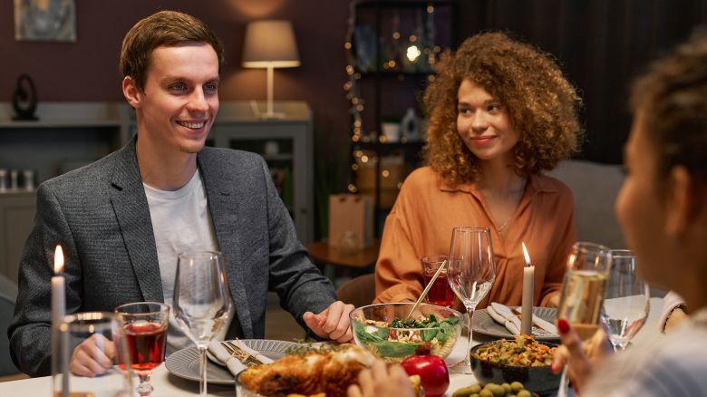 couple at thanksgiving dinner STOCK