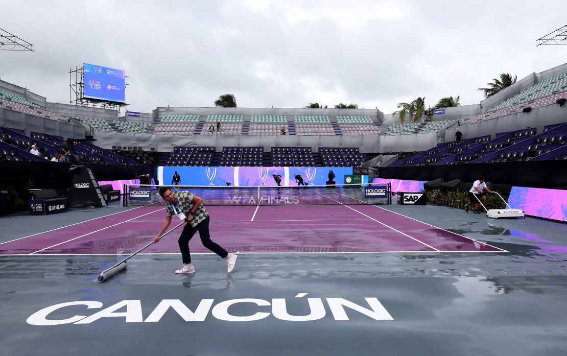 Court staff attempt to dry the court after rain delays the start of play during day 7 of the GNP Seguros WTA Finals Cancun 2023 part of the Hologic WTA Tour on November 04, 2023 in Cancun, Mexico.