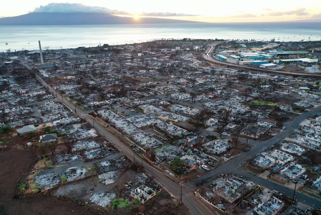 LAHAINA, HAWAII - OCTOBER 07:  In an aerial view, burned structures and cars are seen nearly two months after a devastating wildfire on October 07, 2023 in Lahaina, Hawaii. The wind-whipped wildfire on August 8th killed at least 98 people while displacing thousands more and destroying over 2,000 buildings in the historic town of Lahaina, most of which were homes. A phased reopening of tourist resort areas in west Maui is set to begin October 8th on the two-month anniversary of the deadliest wildfire in modern U.S. history. Many local residents feel that the community needs more time to grieve and heal before reopening to tourists while the Maui economy is estimated to be losing around $13 million per day to lost tourism. (Photo by Mario Tama/Getty Images)