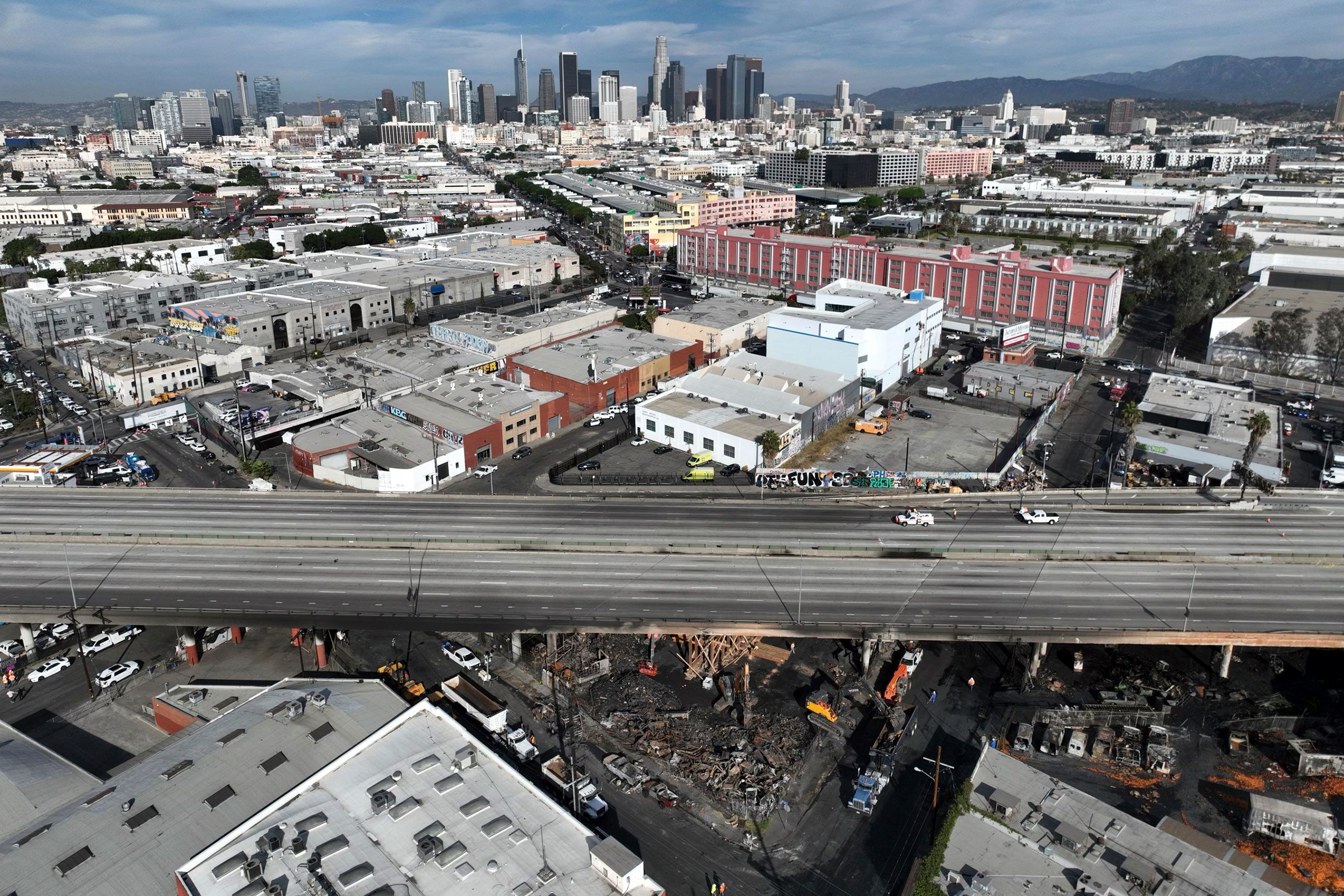 A portion of Interstate 10 in Los Angeles is mostly empty on Monday, November 13, after it was ravaged by a massive fire over the weekend.