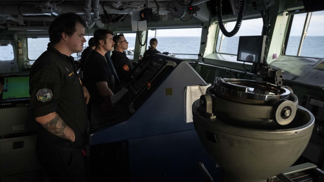 (L-R) Lieutenant(Navy) Jacob Broderick, Sub-Lieutenant Ben Hughes, Naval Warfare Officers, and Commander Sam Patchell, Commanding Officer of HMCS Ottawa, perform their duties on the bridge of the ship as it conducts a transit through the Taiwan Strait during Indo-Pacific Deployment on 2 November 2023.
*Image has been digitally altered for operational security*