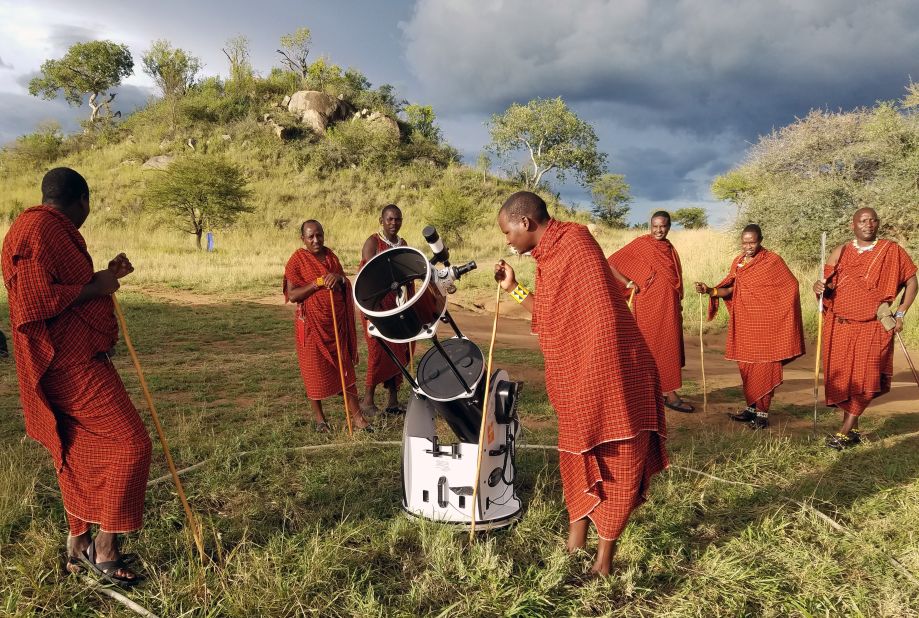 The Travelling Telescope initiative has a mission to inspire children across Africa and give people, including the Maasai, pictured, a chance to look through a telescope at least once in their lifetime.