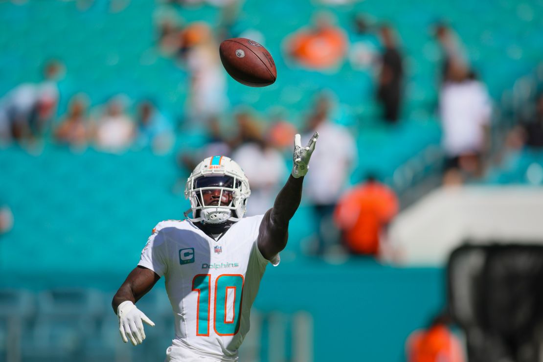 Oct 15, 2023; Miami Gardens, Florida, USA; Miami Dolphins wide receiver Tyreek Hill (10) catches the football during warmups prior to the game against the Carolina Panthers at Hard Rock Stadium. Mandatory Credit: Sam Navarro-USA TODAY Sports