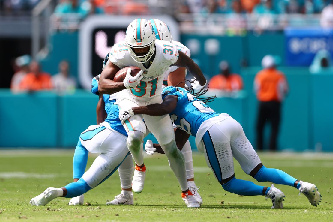 MIAMI GARDENS, FLORIDA - OCTOBER 15: Raheem Mostert #31 of the Miami Dolphins runs the ball during the first half in the game against the Carolina Panthers at Hard Rock Stadium on October 15, 2023 in Miami Gardens, Florida. (Photo by Megan Briggs/Getty Images)