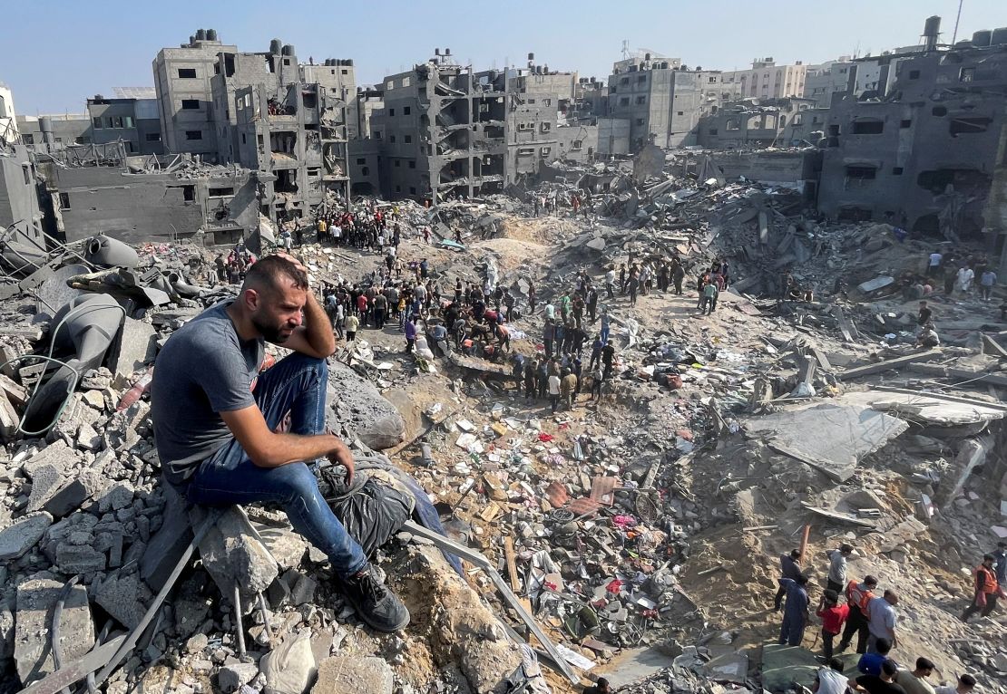 A man gestures as Palestinians search for casualties a day after Israeli strikes on houses in Jabalia refugee camp in the northern Gaza Strip, November 1, 2023. REUTERS/Mohammed Al-Masri