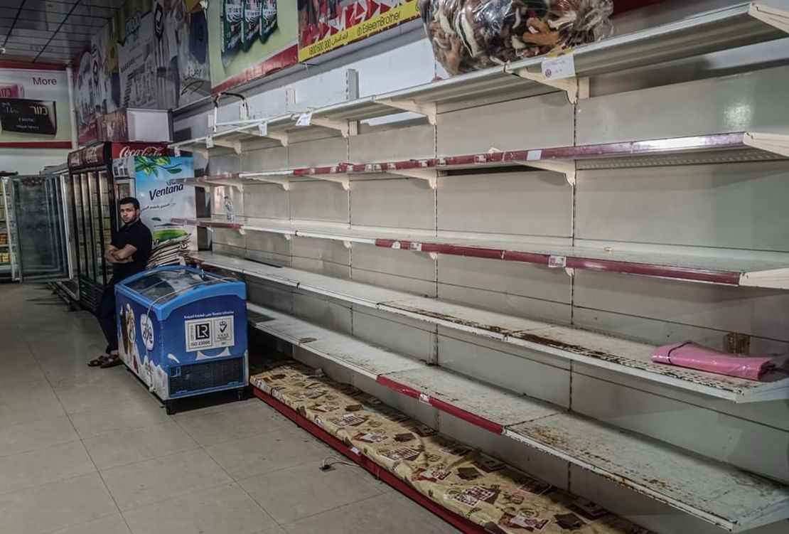 Empty supermarket shelves in Gaza.